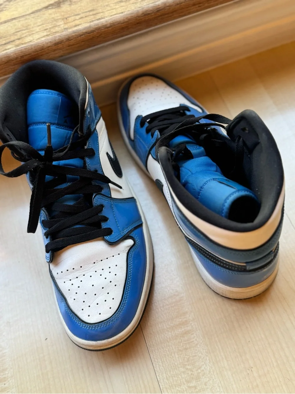 Jordan Men’s High-Top Sneakers in White, Blue and Black